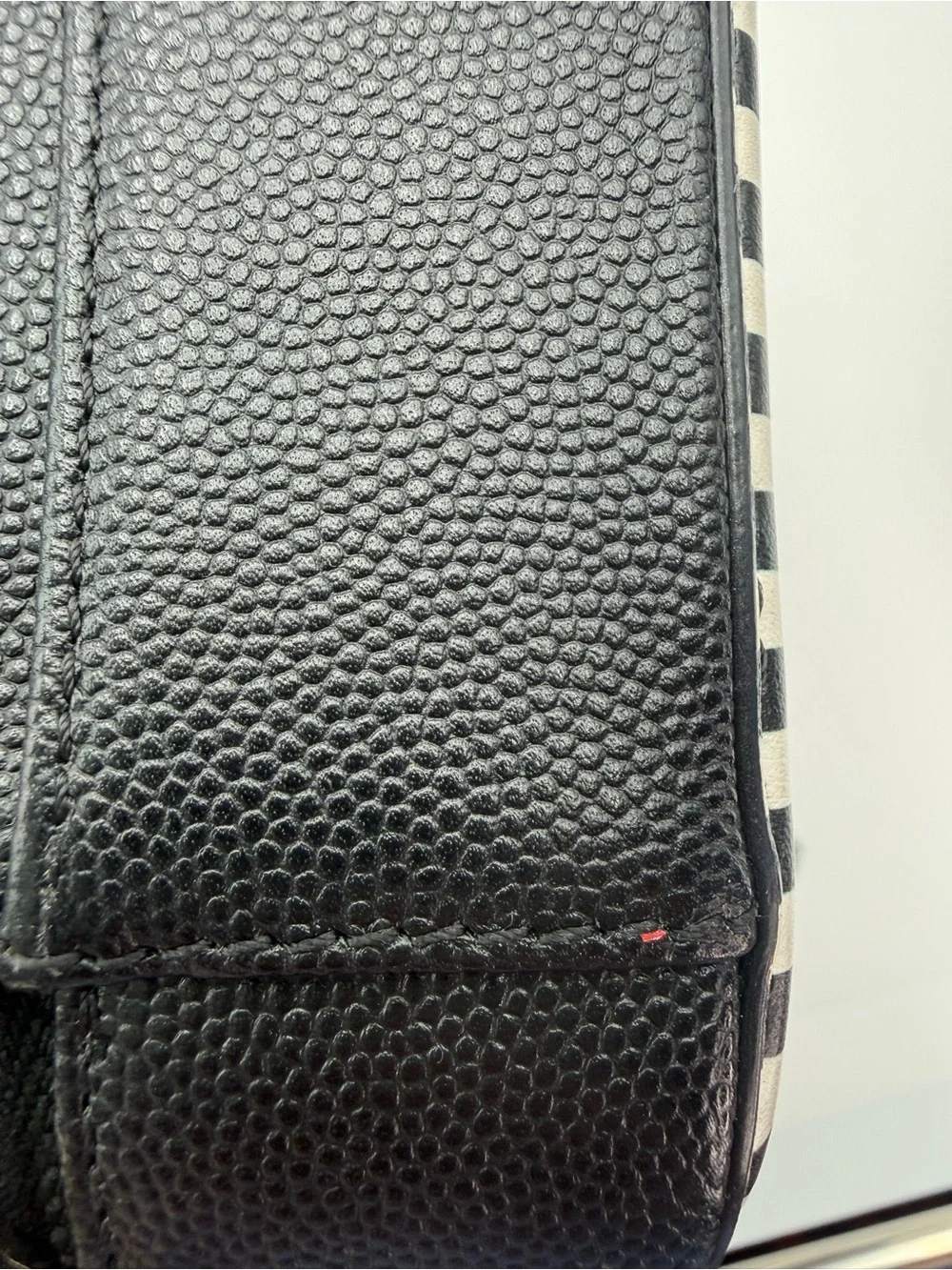 Chanel black and white filigree vanity bag in caviar leather